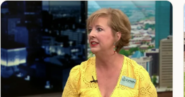 Lisa Buck being interviewed on the News 9 studio set